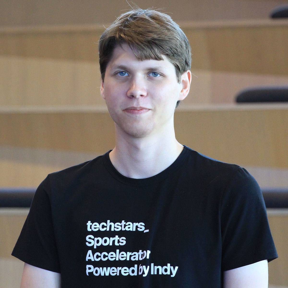 Yev wearing a Techstars Sports Accelerator shirt during his startup chapter